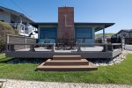 This great beach home has a large front deck to enjoy the nice weather